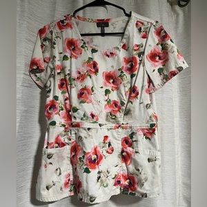 Jaanuu peplum scrub top